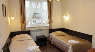Гостиница TGK Koleso Hotel Вельск Двухместный номер с 2 отдельными кроватями и собственной ванной комнатой-4